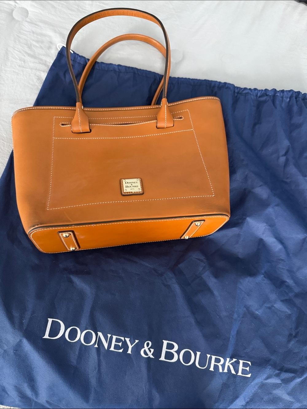 Dooney & Bourke Saddle Brown Leather Tote with Gold Plaque